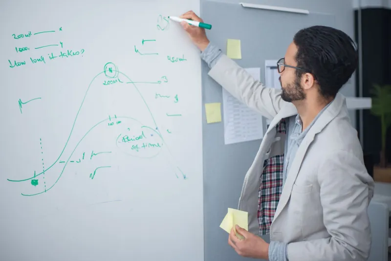 Whiteboard of Sorrows: A Stratigraphic Analysis of Corporate America's Most Passive-Aggressive Break Room Surface